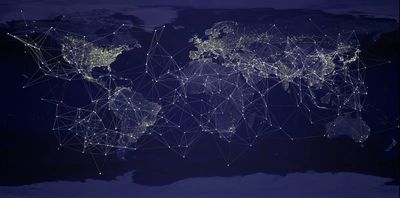 Illustration of the night side of the earth, city lights across every continent, overlaid with a mesh of points joined by thin straight lines.